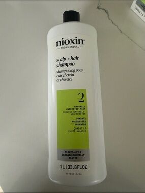Nioxin Scalp + Hair Shampoo System 2 - White Bottle with Lime Label 1L